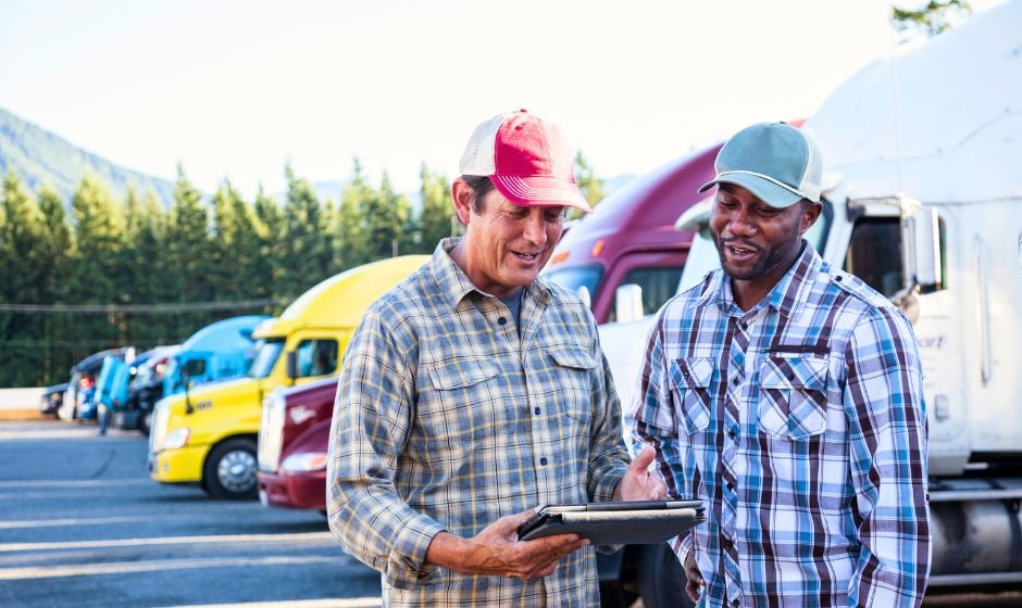 Trucker and manager discuss fleet