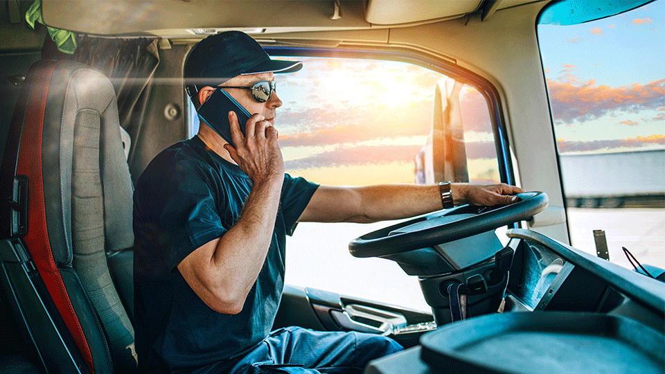 Truck-Driver-on-Phone-With-Customer