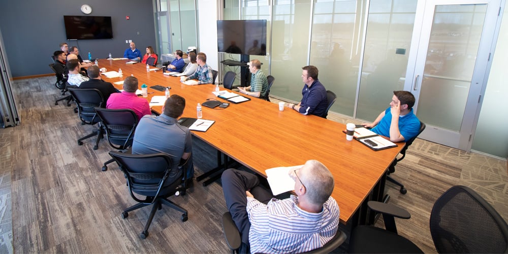Sales leaders meeting in conference room
