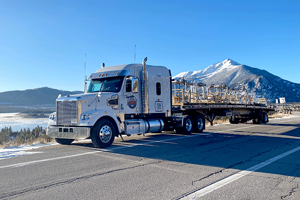 flatbed-trailer-truck-parked-highway