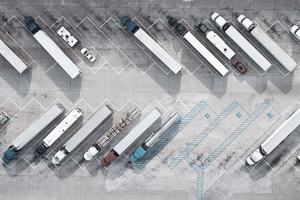 multiple-semi-tractors-trailers-parked-truck-stop