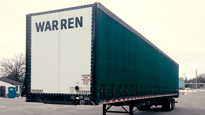 Straped down curtainside trailers