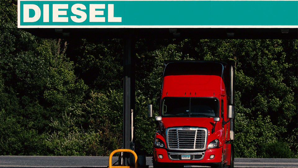 Semi-truck-parked-diesel-station-filling-up