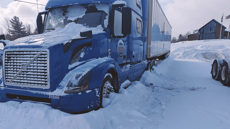 dry-van-truck-trailer-covered-in-snow