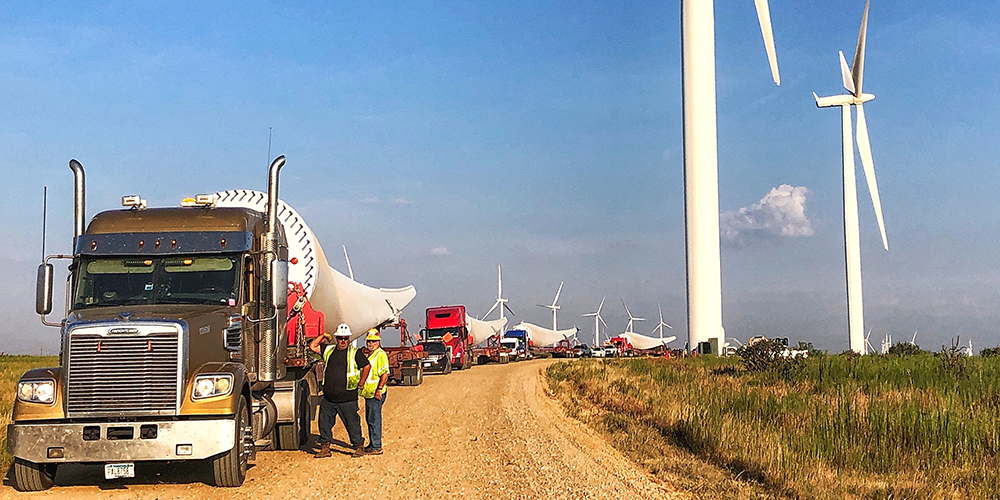 Blade-Trucks-Lined-Up-on-Wind-Site