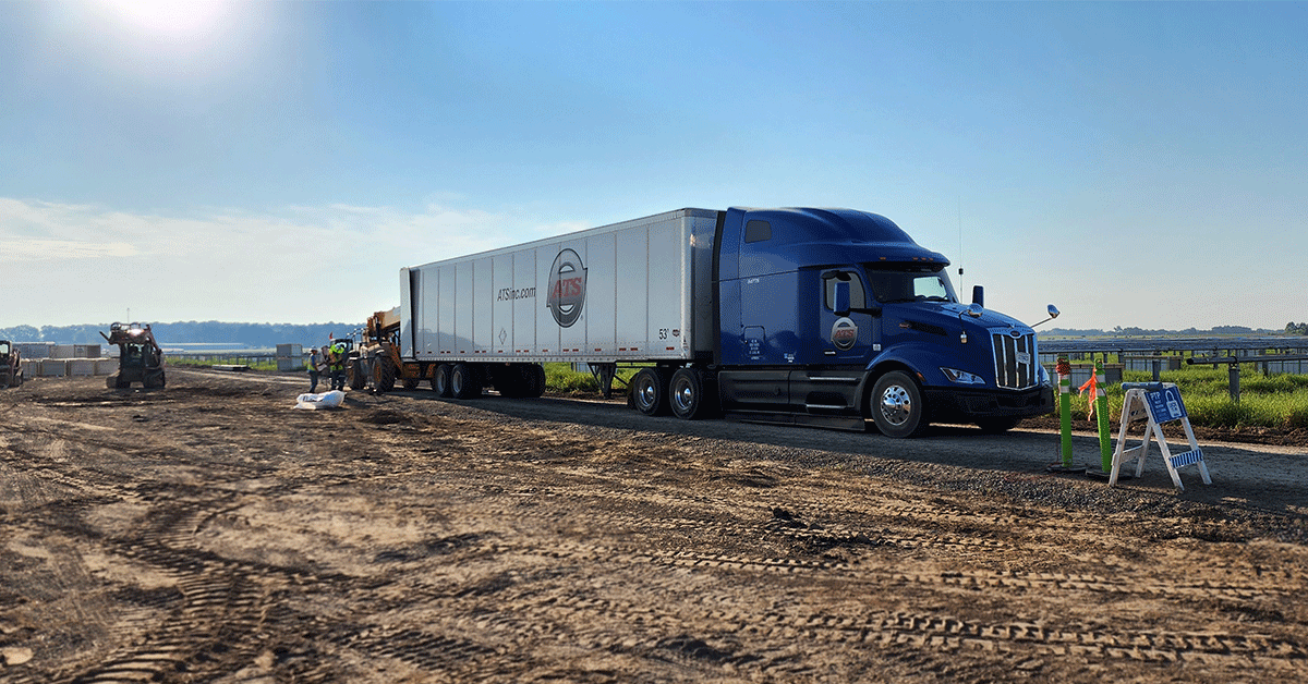Dry-van-trailer-at-job-site-being-unloaded
