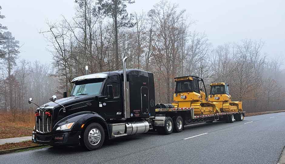 Flatbed-truck-hauling-equipment