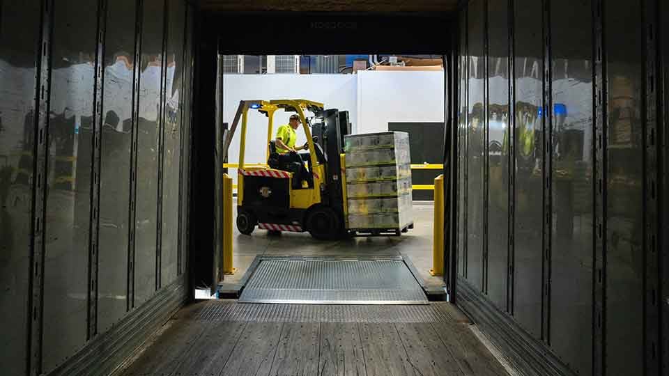 Forklift-loading-a-van