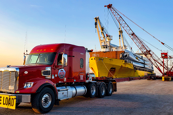 Truck parked at the port getting loaded