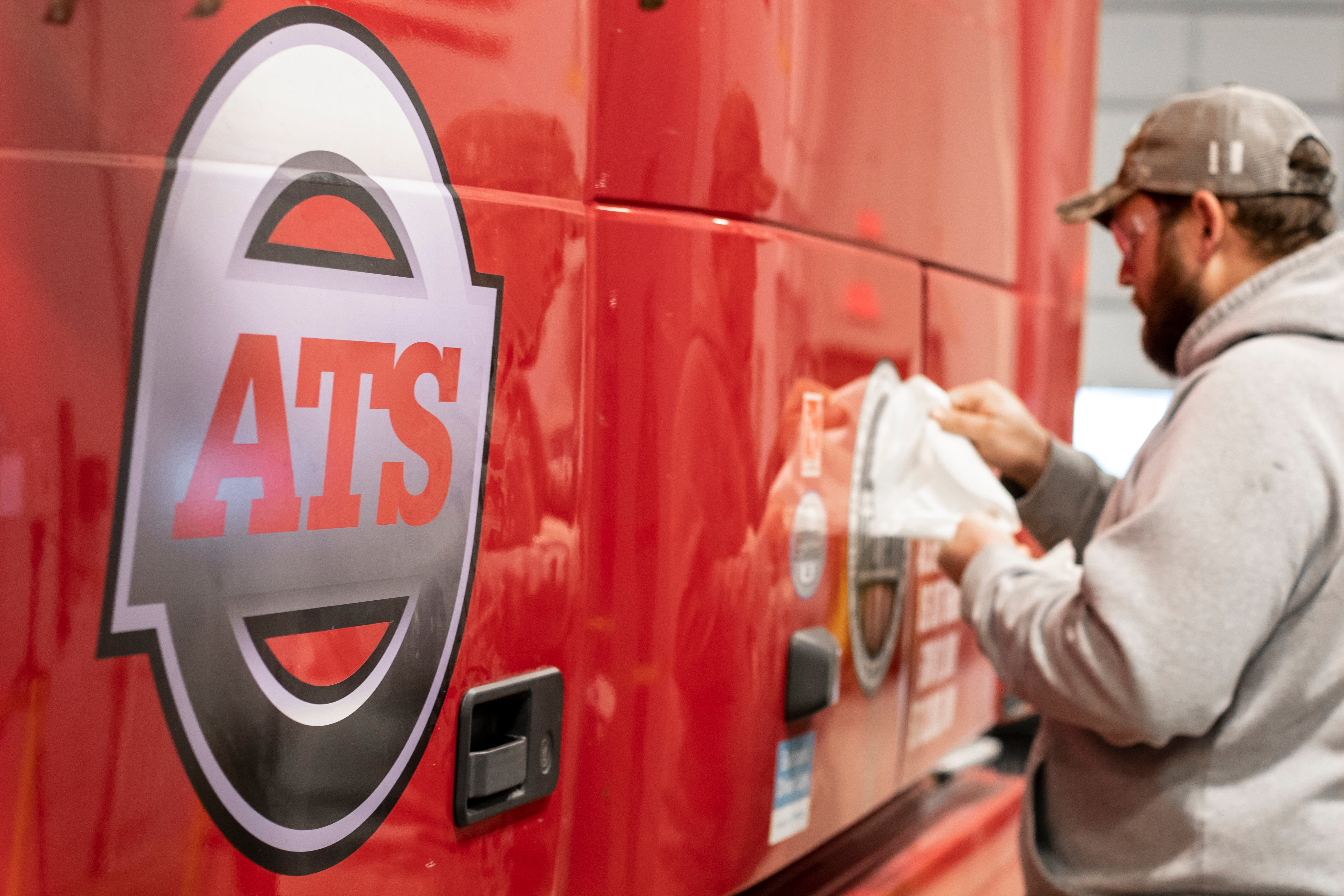 ATS military decal being applied to truck