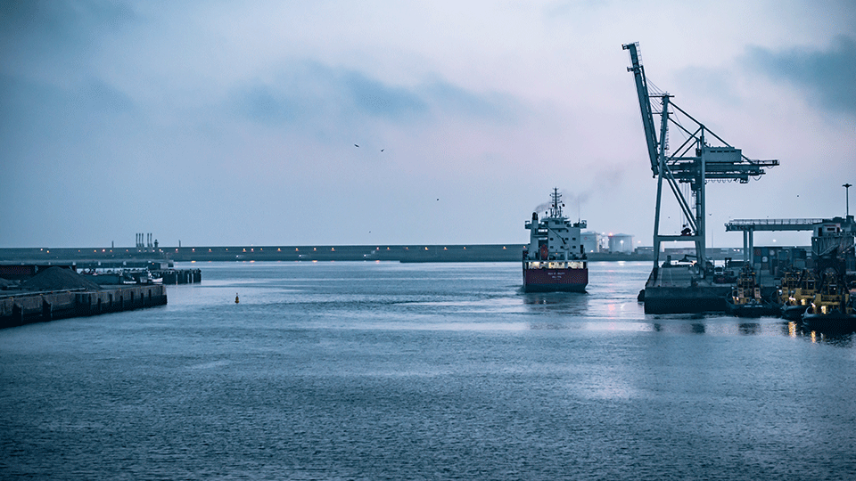 International Shipping Port With Crates and Crane