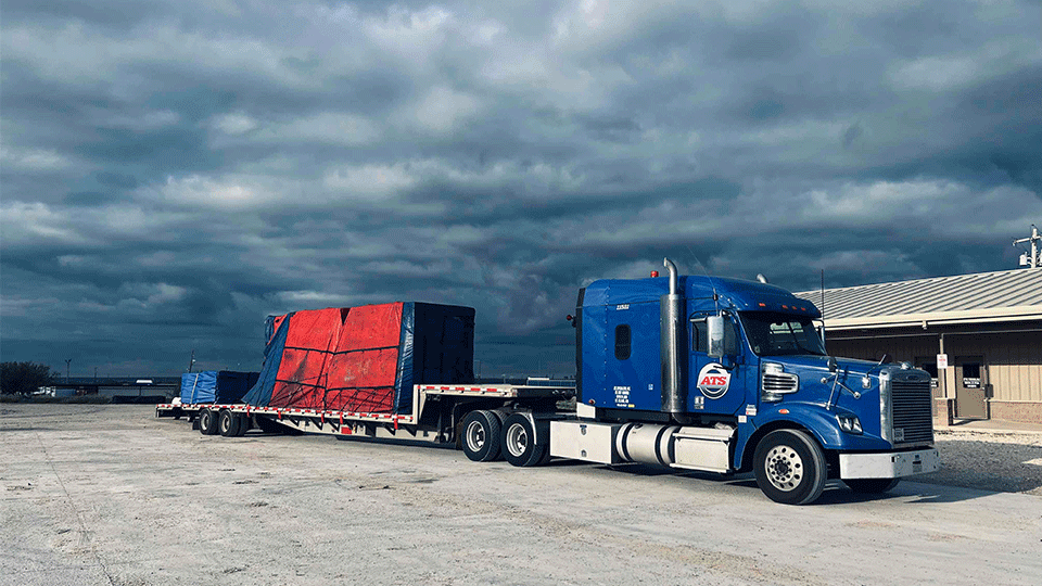 53-foot-step-deck-trailer-with-tarped-freight