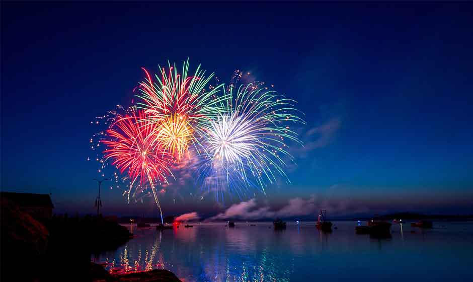 New Year's fireworks over a body of water