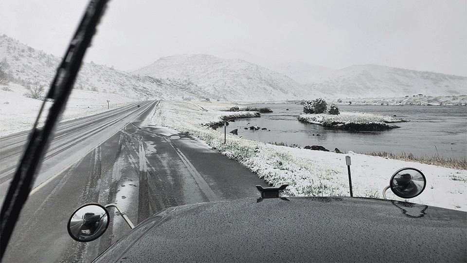 A trucker's POV from behind the wheel of a semi in winter