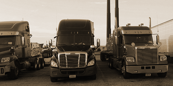 Semi trucks in parking lot