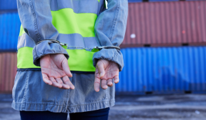Person handcuffed for cargo theft in trailer yard