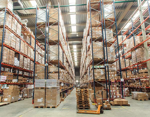 Warehouse with boxes on tall shelves