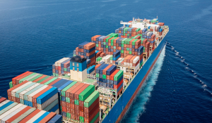 An ocean vessel carrying containerized freight 