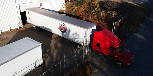 Freight shipment parked at loading dock