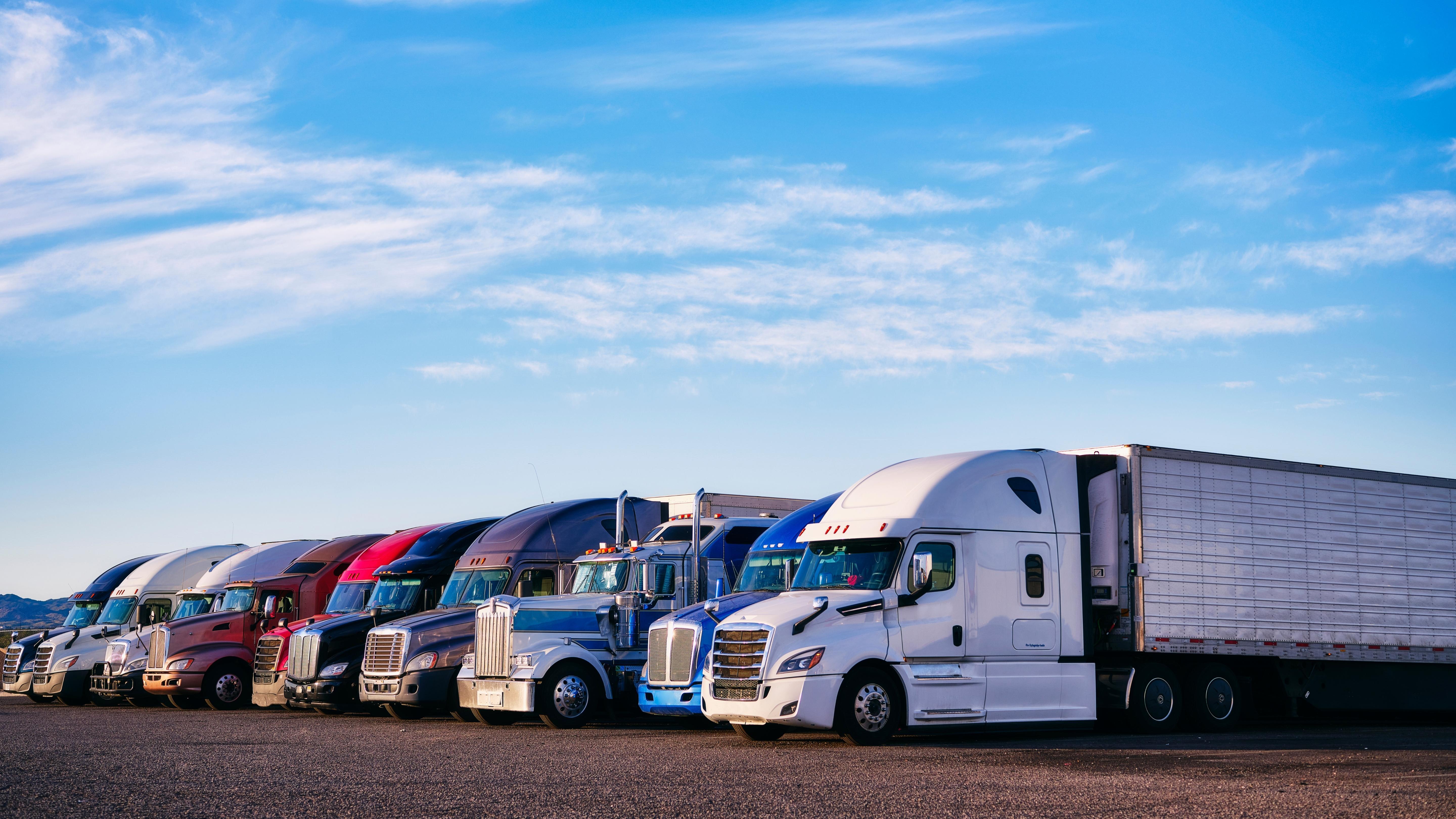 Semi trucks parked close together